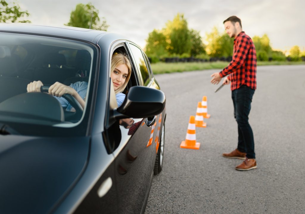 male-instructor-happy-with-driving-of-his-student.jpg